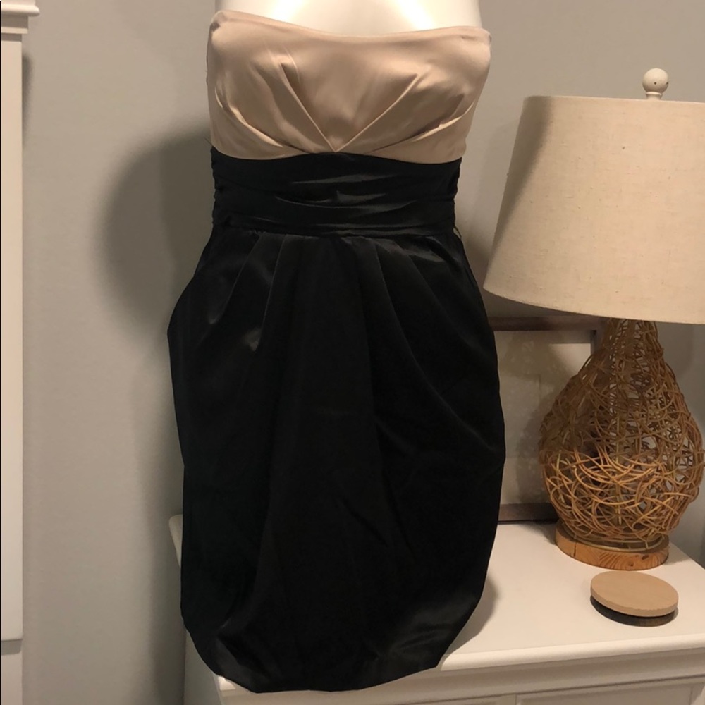 Medium silk-like strapless tan and black dress